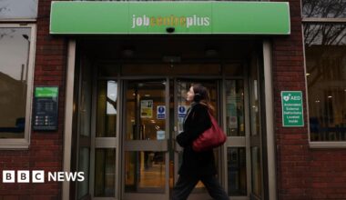 A promo promoting the News Daily newsletter - a graphic of an orange sphere with two concentric crescent shapes around it in a red-orange gradient, like a sound wave.