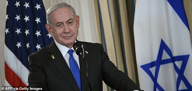 (FILES) Israeli Prime Minister Benjamin Netanyahu participates in a press conference with US President Donald Trump in the State Dining Room of the White House in Washington, DC on September 29, 2025. US President Donald Trump said on October 8, 2025 that Israel and Hamas had agreed on the first phase of his Gaza peace plan, hailing it as a "historic and unprecedented" step to ending the two-year-old war. Palestinian militant group Hamas would release all hostages while Israel would pull its troops back to an agreed on line, Trump said after talks in Egypt on his 20-point peace plan resulted in a deal. (Photo by ANDREW CABALLERO-REYNOLDS / AFP) (Photo by ANDREW CABALLERO-REYNOLDS/AFP via Getty Images)