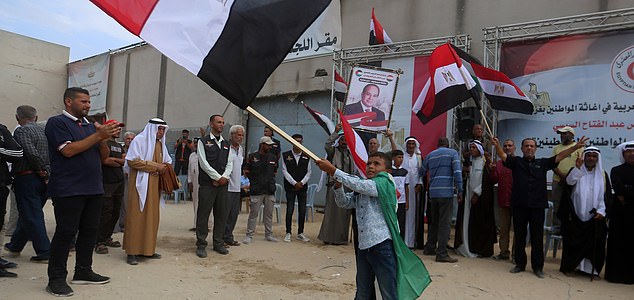 Mandatory Credit: Photo by Hassan Al-Jadi/UPI/Shutterstock (15525839m) Palestinians carrying Palestinian and Egyptian flags celebrate in the Gaza Strip after news of a new ceasefire agreement in Deir al-Balah on October 9, 2025. On the same day, Israel and Hamas reached a deal to release the remaining living hostages-a major step toward ending a war that has claimed tens of thousands of lives and triggered a humanitarian catastrophe. Palestinians Celebrate in Gaza Following News Of a New Gaza Ceasefire Deal, Deir Al-Balah, Palestinian Territories - 09 Oct 2025