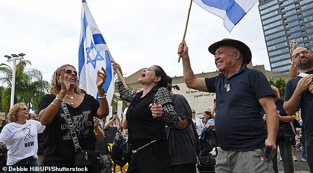 Mandatory Credit: Photo by Debbie Hill/UPI/Shutterstock (15525743b) People gather in Hostage Square in Tel Aviv to celebrate the agreement for U.S. President Donald Trump's peace plan, to end the Israel-Hamas war, on Thursday, October 9, 2025. The first phase of the plan will include the release of all hostages, Palestinian prisoners and the entry of humanitarian aid to Gaza. October 9, 2025. Israelis Celebrate The Ceasefire Agreement In Hostage Square, Tel Aviv, Israel - 09 Oct 2025