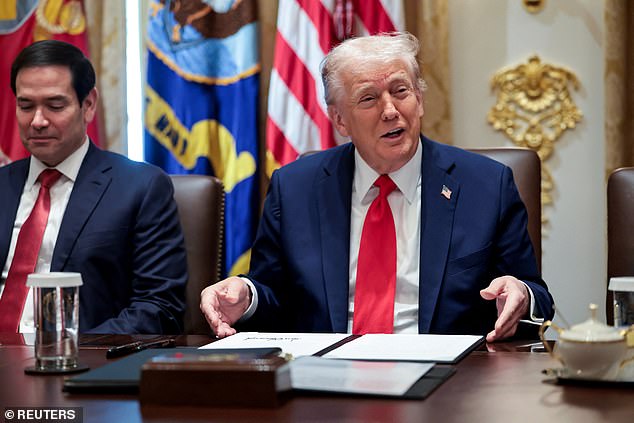 U.S. President Donald Trump and U.S. Secretary of State Marco Rubio attend a cabinet meeting at the White House in Washington, D.C., U.S., October 9, 2025. REUTERS/Evelyn Hockstein