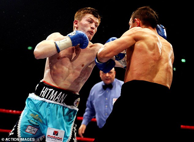 FILE PHOTO: Boxing - Ricky Hatton v Kostya Tszyu IBF World Light-Welterweight Title - MEN Arena - 4/6/05  Ricky Hatton lands a punch on Kostya Tszyu  Action Images via Reuters/Andrew Couldridge/File Photo