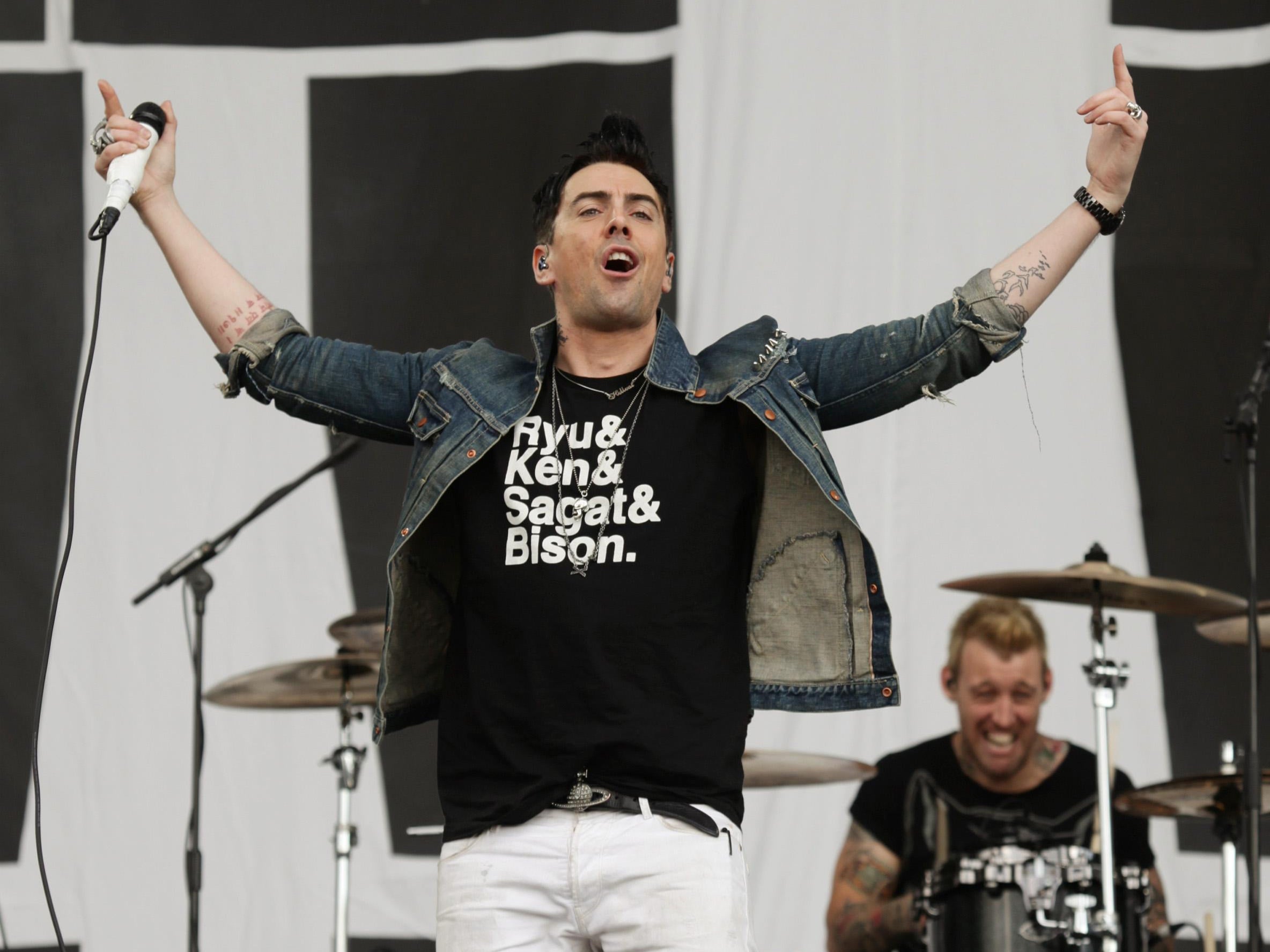 Watkins pictured performing at the Reading Festival prior to his convictions