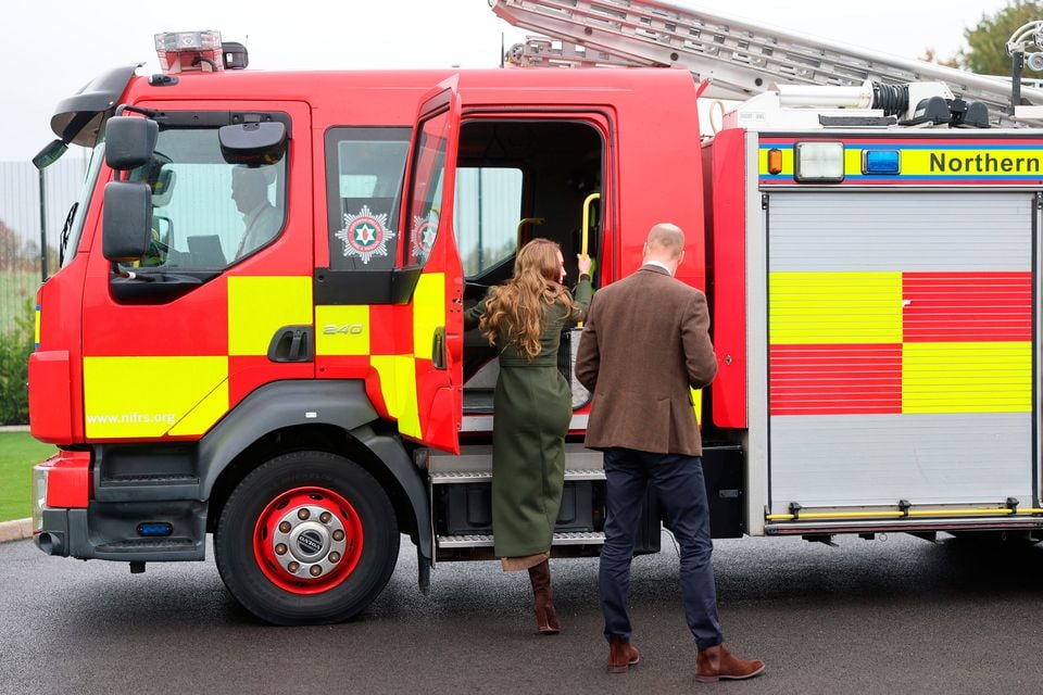 William and Kate board a fire engine at the centre near Cookstown. Chris Jackson/PA Wire