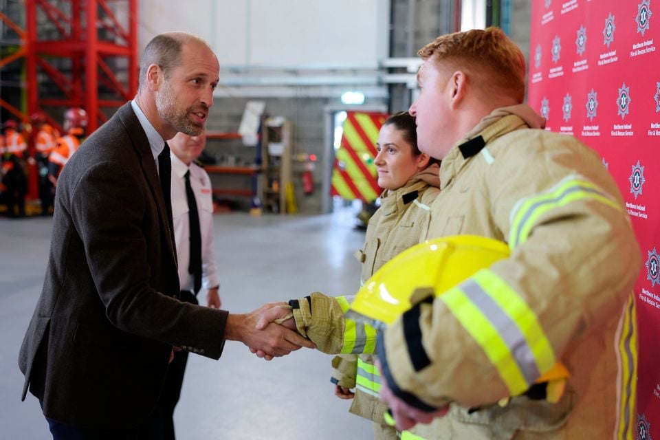 The royal couple speak with firefighters near Cookstown, Co Tyrone. Chris Jackson/PA Wire
