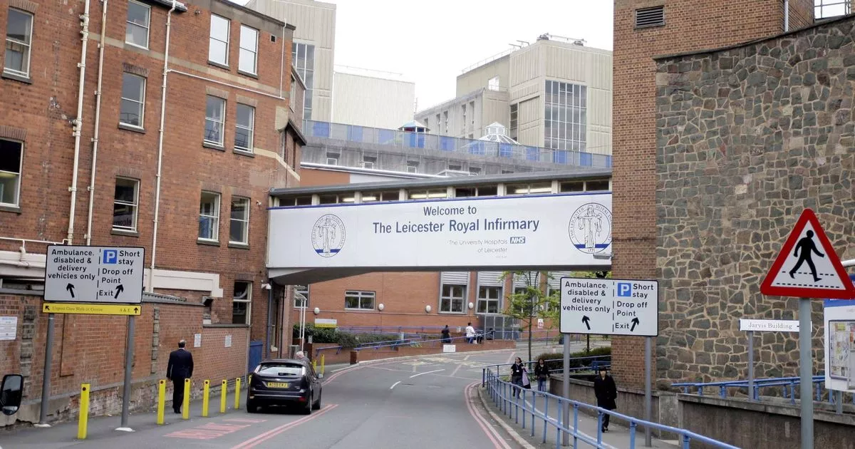 Motion blurred police car or ambulance speeding down street in London, horizontal orientation, England, UK.