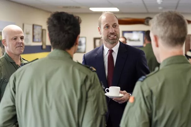 Prince William, Prince of Wales meets aircrew and staff