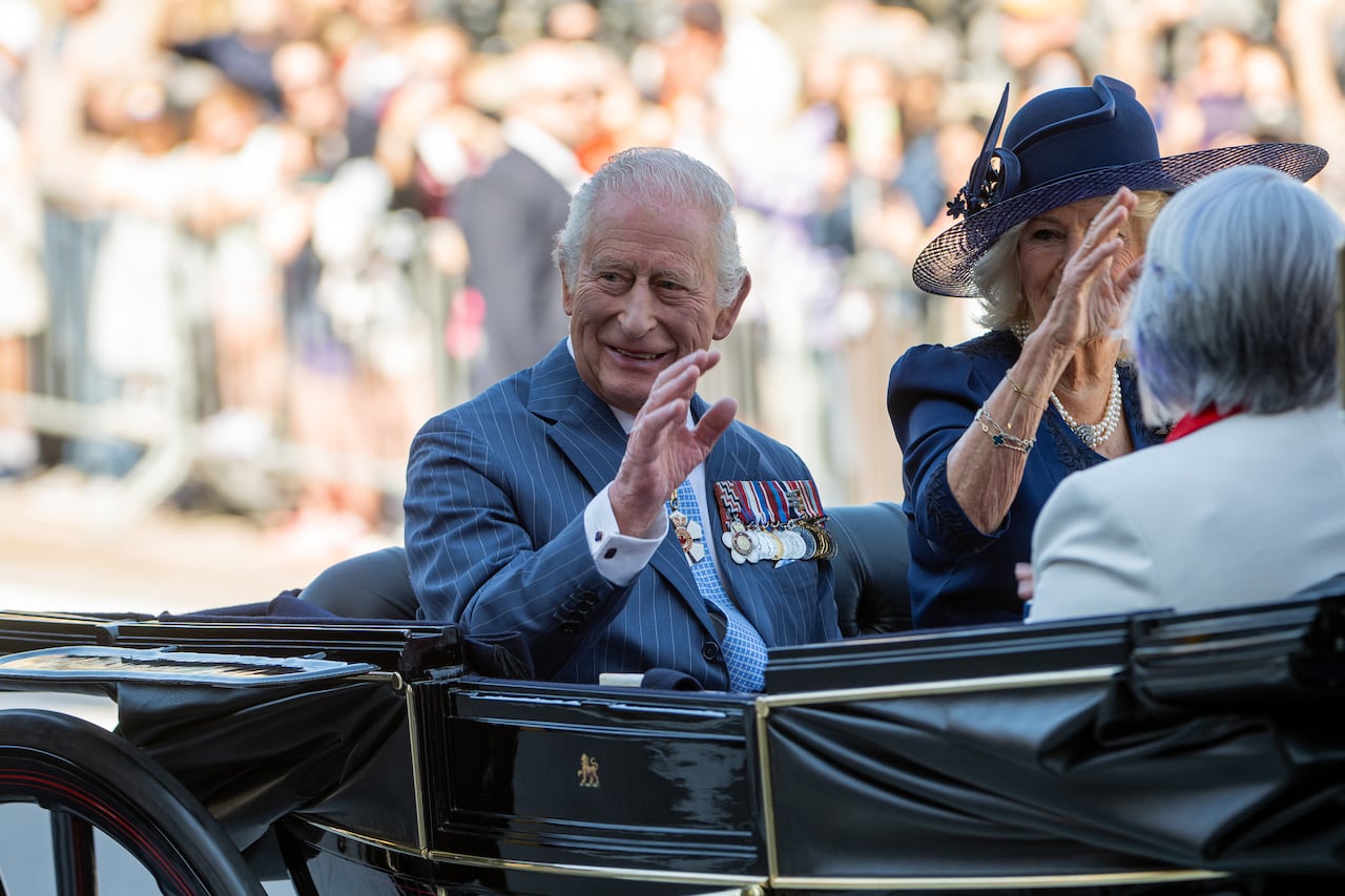 King Charles and Queen Camilla travel by Canada’s State Landau towards the Senate of Canada building in Ottawa on Tuesday, May 27, 2025.