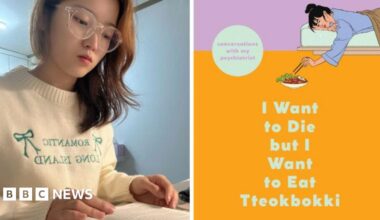 A composite image of Julie Yoonnyung Lee in a cream-coloured jumper with light blue writing reading a book on the left-hand side, and on the right-hand side of the composite image, the purple and orange book cover of 'I Want to Die but I Want to Eat Tteokbokki' by Baek Se-hee.