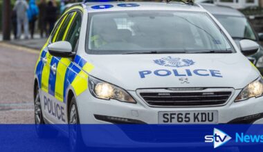 Man arrested after car 'driven at police vehicle' before crash in Glasgow