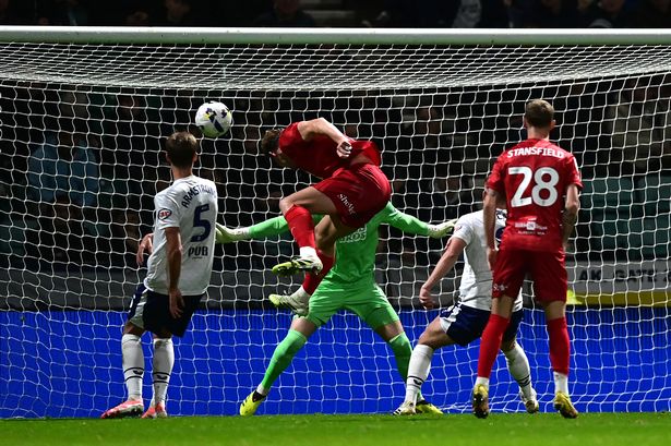 Phil Neumann of Birmingham City scores