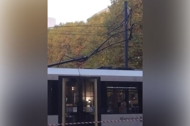 A pantograph appeared to detach from an overhead power line at Portland Street on Wednesday