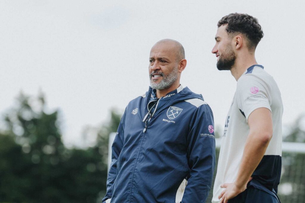 Nuno Espirito Santo talks to max Kilman at West Ham's training ground