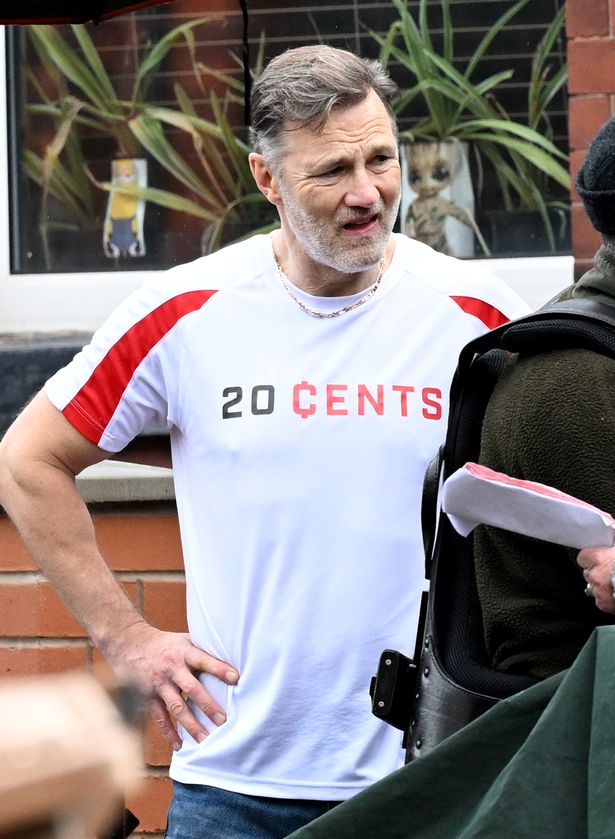 David Morrissey was seen leading the pack of football fans, with a shirt sporting the name 20 Cents