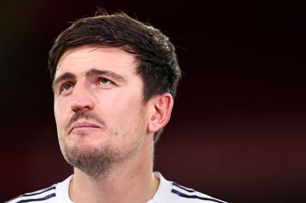 Harry Maguire looks on during a Manchester United match