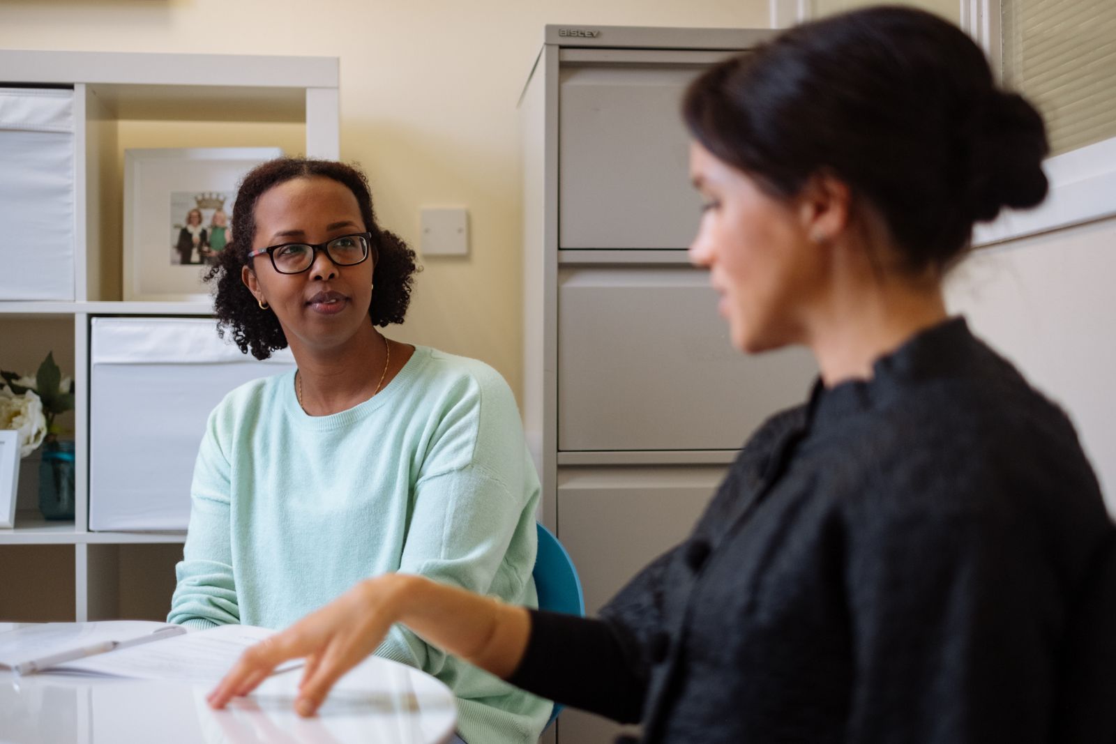 Image may contain Human Person Glasses Accessories Accessory Sitting Furniture and Finger