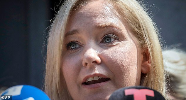 FILE - Virginia Roberts Giuffre speaks during a news conference outside a Manhattan court in New York, Aug. 27, 2019. (AP Photo/Bebeto Matthews, File)