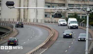 The Mancunian Way, a motorway, with light traffic way travelling in either direction in the day time.