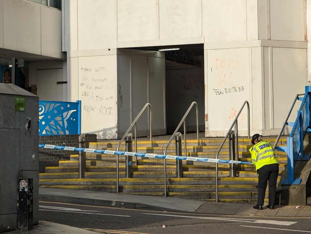 Police cordon in place near the steps leading up to the entrance of the Bullring