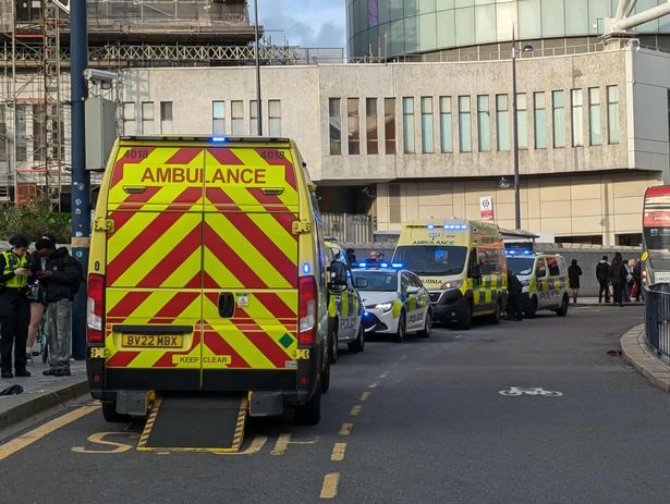 Police and paramedics in Birmingham city centre