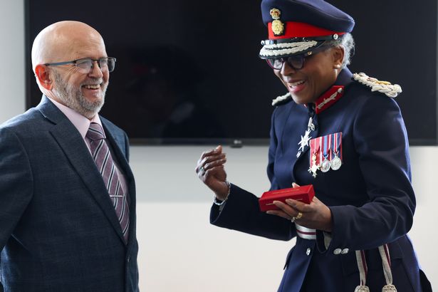 Mike Alden chairman of Park Knowle FC in Bristol, , receives his British Empire Medal, Monday 20 October 2025, from the kings Lieutenant Governor Peaches Golding. 