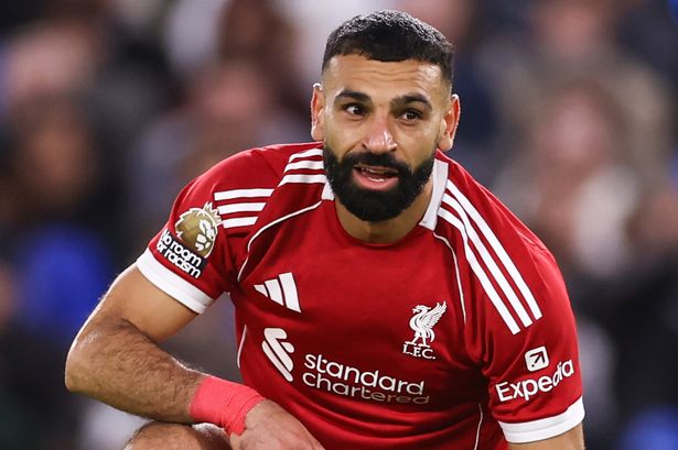 Mohamed Salah taking a knee on the pitch