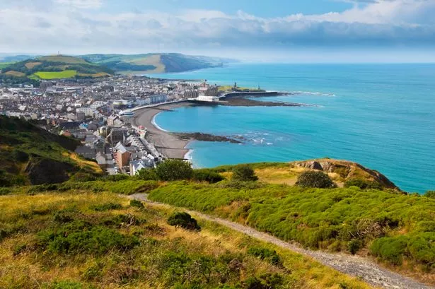 Aerial view from Constitution Hill over Aberystwyth, the sea and Welsh coast