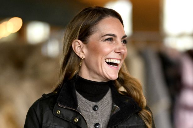 Britain's Catherine, Princess of Wales laughs during her visit to Mallon Farm, a flax farm, spearheading the revival of flax growing for linen, as a blueprint for sustainable farming systems, in Cookstown, Northern Ireland on October 14, 2025. (Photo by Samir HUSSEIN / POOL / AFP) (Photo by SAMIR HUSSEIN/POOL/AFP via Getty Images)