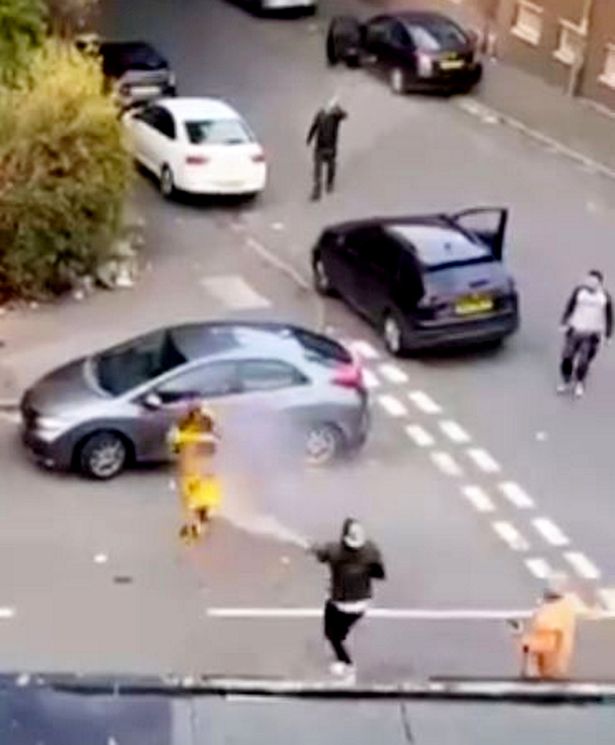 A have-a-go hero douses the man with a fire extinguisher