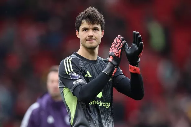 Senne Lammens of Manchester United applauds the home fans after the Premier League match between Manchester United and Sunderland