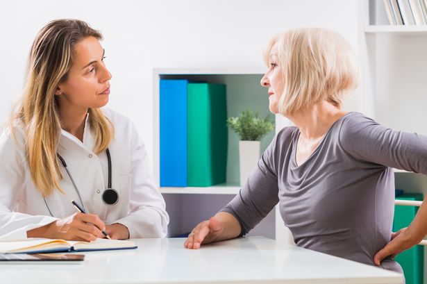 Older woman with back pain, generic