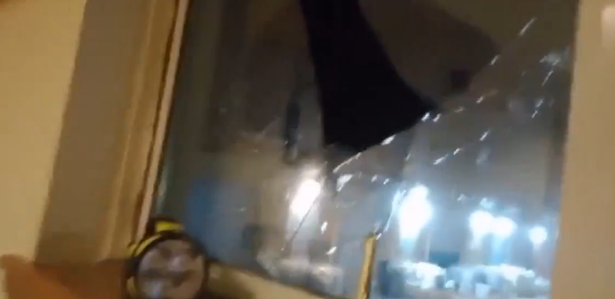 Windows were smashed by the vandals 