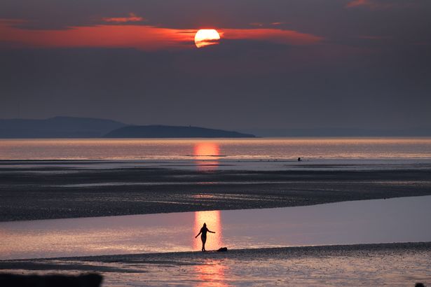 The shifting sandbanks on Llandudno's West Shore are quickly submerged when the tide comes in