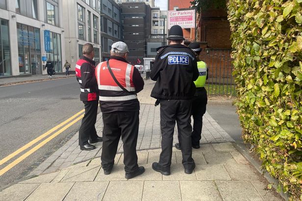 Police and security outside Singers Hill Synagogue in Birmingham
