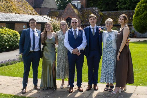Tim with his family at his wedding last year