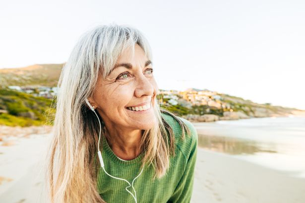 Woman walking on the beach