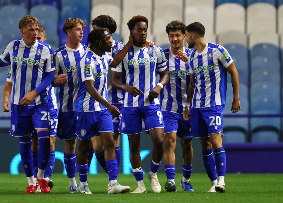 Sheffield Wednesday's Jamal Lowe celebrates with teammates their first goal, an own goal scored by Leeds United's Karl Darlow
