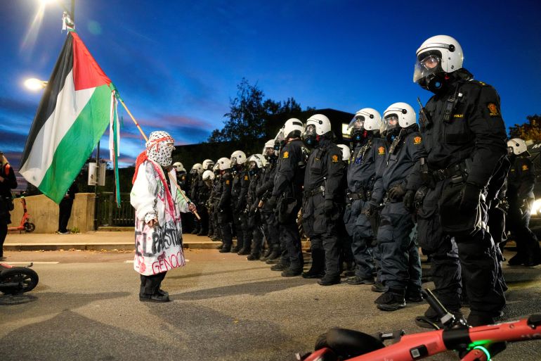 Pro-Palestinian demonstrator reacts.