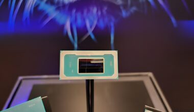 Intel processor on display with code Q D3BA4 visible.