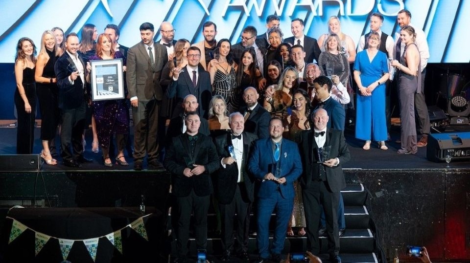 Oldham Business Awards winners line up on the stage after the presentations. Images courtesy of Josh Bowker/New Image