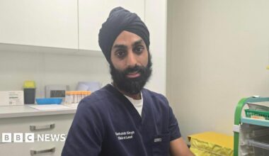 Pharmacist Gurbaksh Singh is sitting in a consulting room at his clinic.