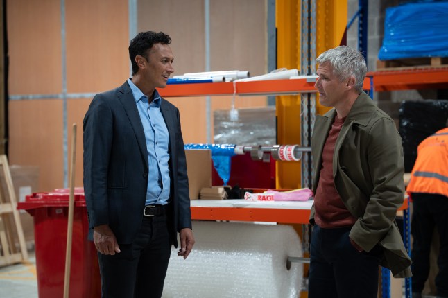 Caleb and Jai argue in the depot in Emmerdale