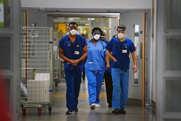 All visitors and patients told to wear face masks.