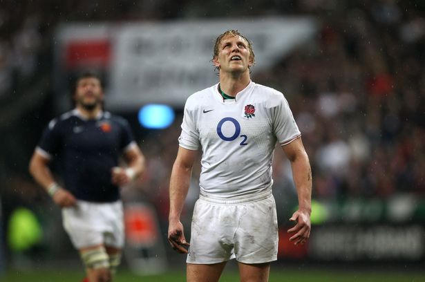 Lewis Moody looks on