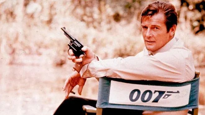 British actor Roger Moore, playing the title role of secret service agent 007, James Bond, on location in England in 1972. Moore, played Bond in seven films, more than any other actor.