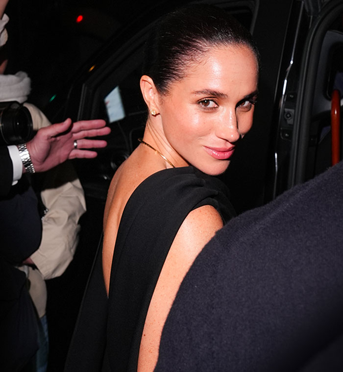 Meghan Markle leaving an event with a sleek hairstyle, highlighting backlash and Lana Del Rey's husband praised for classier response. Meghan Markle leaving an event with a sleek hairstyle, highlighting backlash and Lana Del Rey's husband praised for classier response.