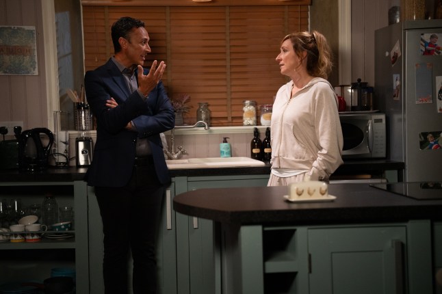 Jai and Laurel talk in the kitchen in Emmerdale