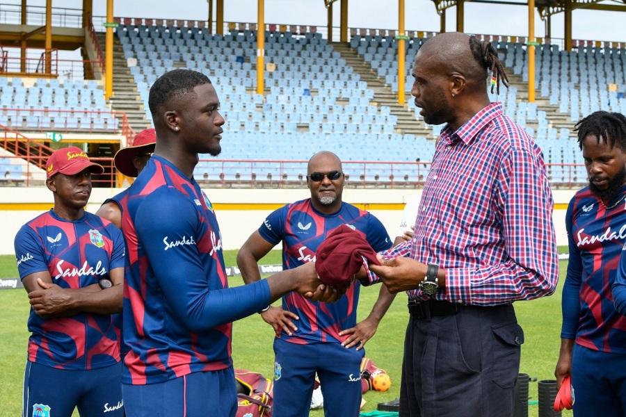 Seales on his idol Curtly Ambrose (right):  Seales on his idol Curtly Ambrose (right):