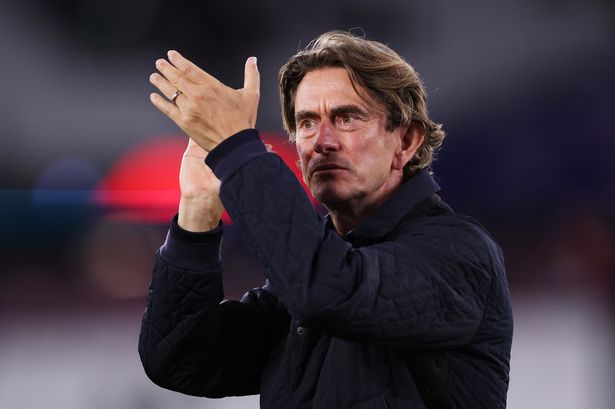 Thomas Frank, Manager of Tottenham Hotspur, claps the fans