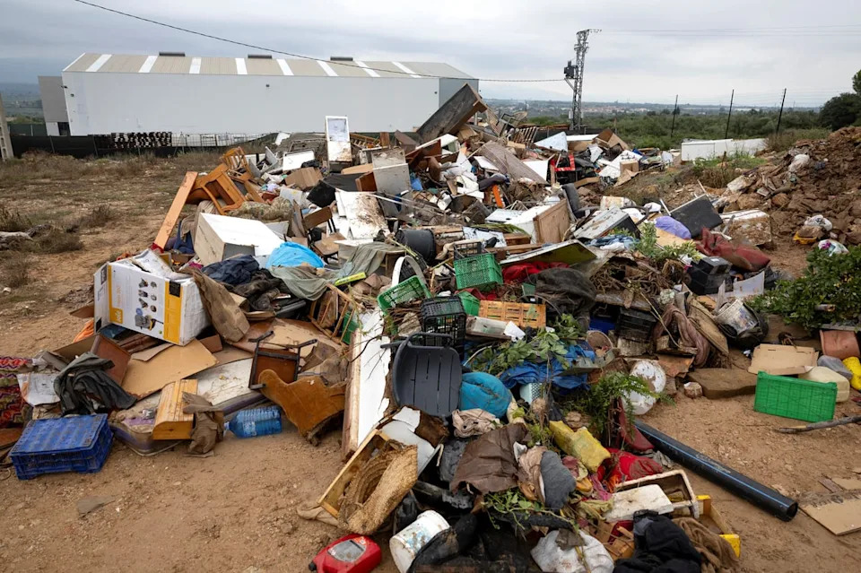 Debris collects from the flood water in Godall, south of Barcelona (AFP via Getty Images)